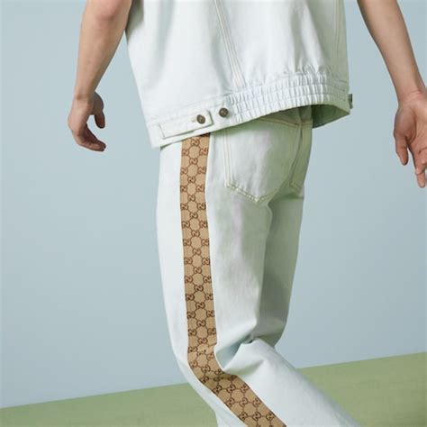 gucci eco washed|Washed organic denim pant with GG in light blue .